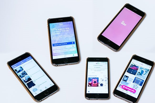 Flere mobiler med skjemer som viser apper for bruktkjøp.Foto